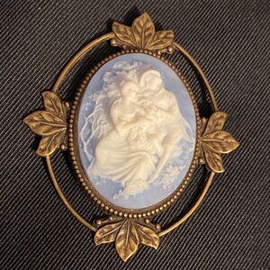 Vintage Blue and white Cameo Brooch in brass frame.